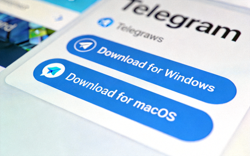 步骤二截图：Telegram官网上的下载按钮特写，显示Download for Windows和Download for macOS选项